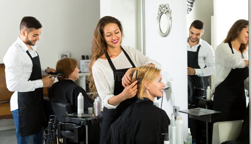 Hairdressers Working in Beauty Salon Stock Image - Image of combing ...