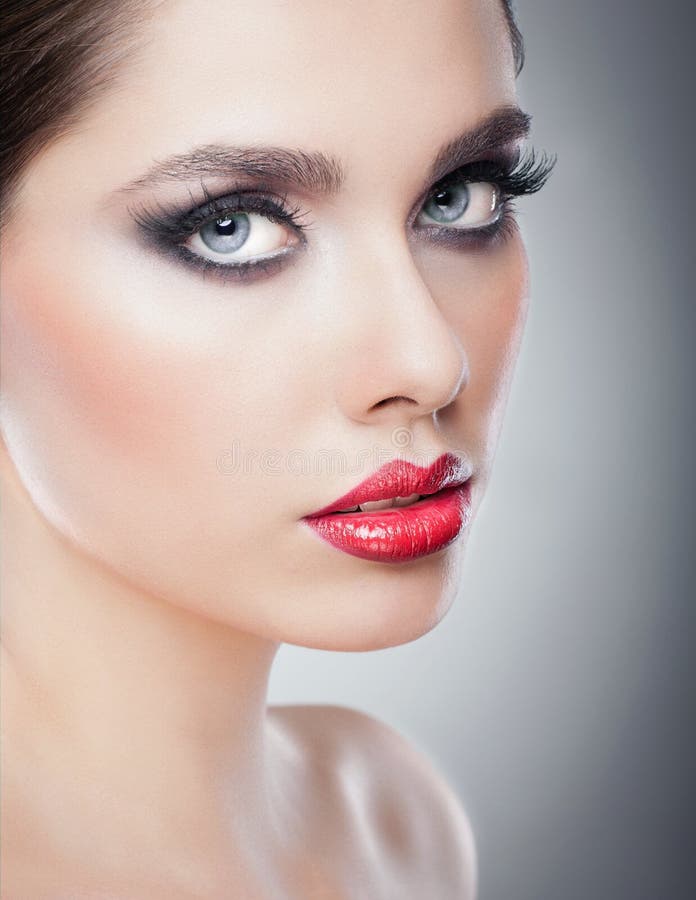 Hairstyle and Make up - beautiful female art portrait with beautiful eyes. Elegance. Genuine Natural brunette in studio royalty free stock photography Hairstyle and Make up - beautiful female art portrait with beautiful eyes. Elegance. Genuine Natural brunette in studio royalty free stock photography