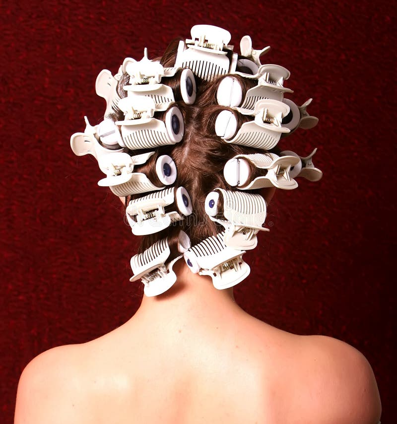 Hairstyling com rolos do cabelo imagens de stock Hairstyling com rolos do cabelo imagens de stock