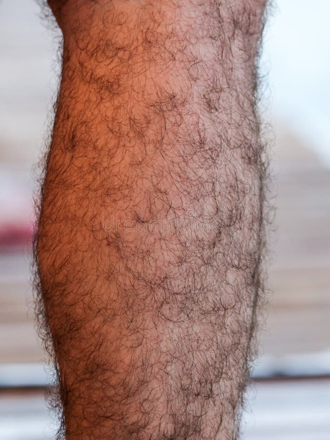 Hairy Legs Of A Woman In Red Shoes Stock Image - Image of 