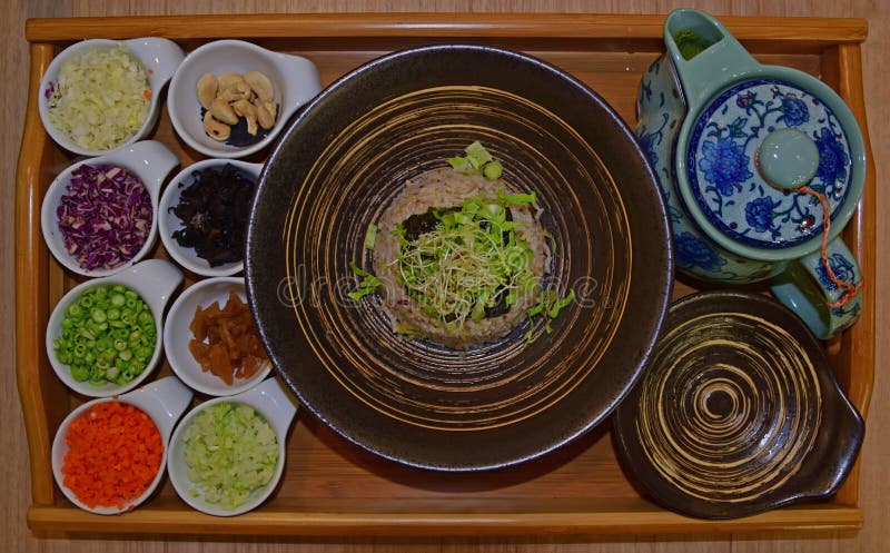 Hakka Tea Rice (Lei Cha) served on wooden tray