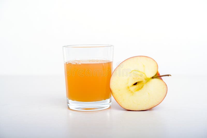 Half Apple with Glass of Naturally Cloudy Juice Stock Image Image of