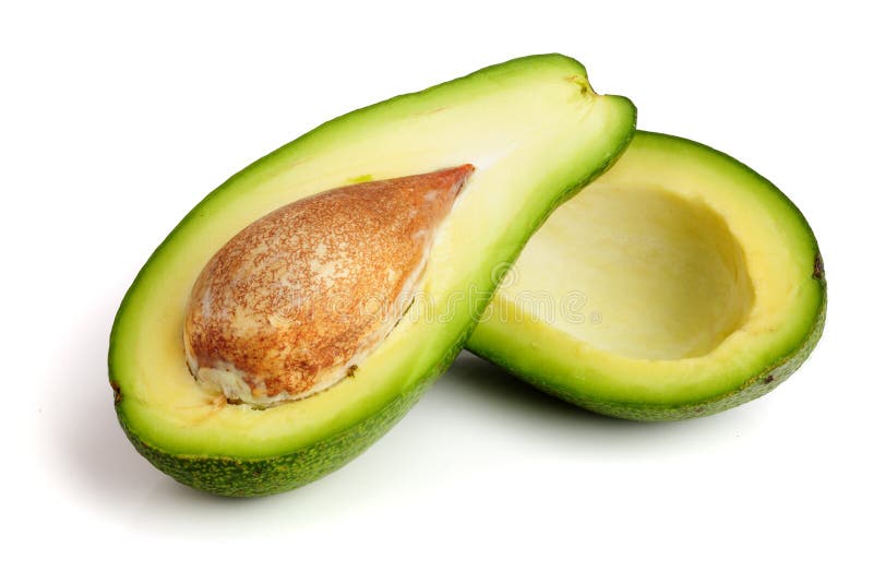 Half avocado on white background close-up stock photography
