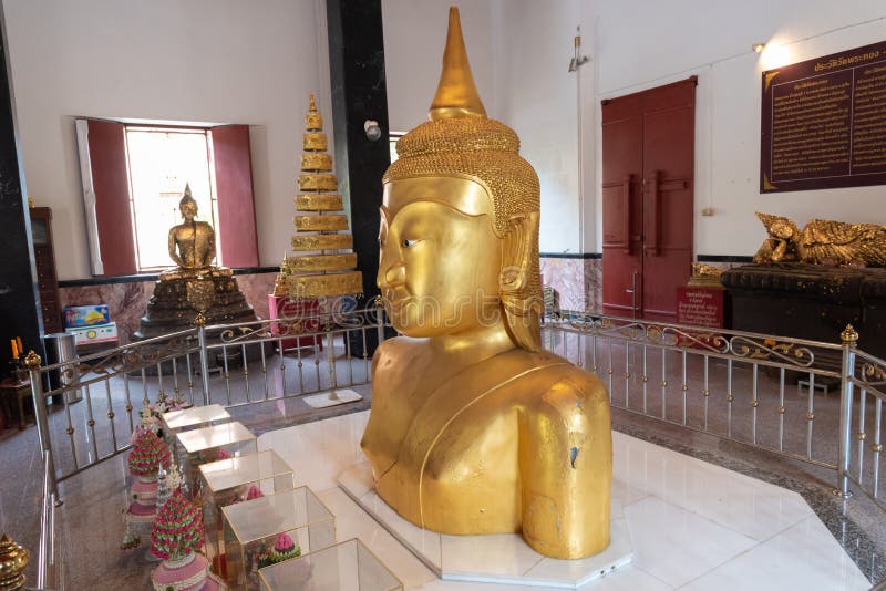 Half big golden Buddha statues in Wat Phra Tong, Called