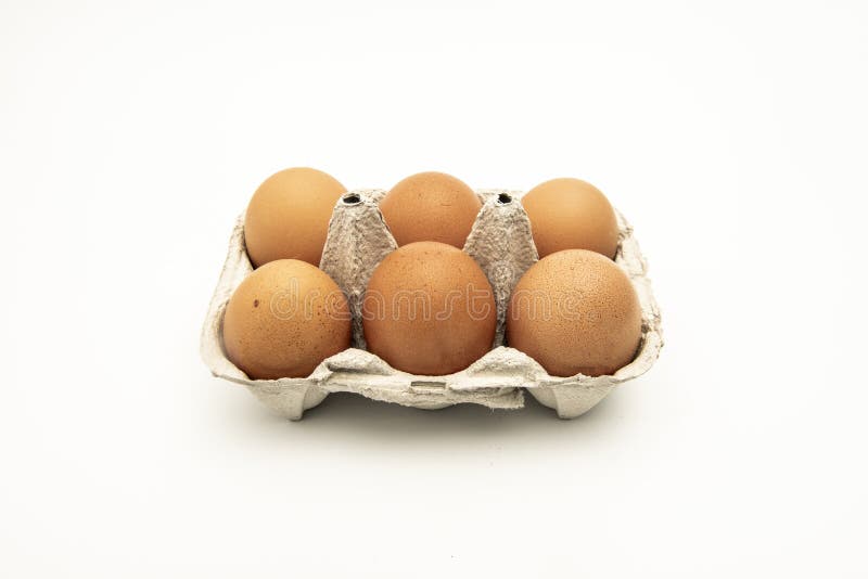 Half a Dozen Brown Eggs in a Container or Egg Cup Stock Image Image