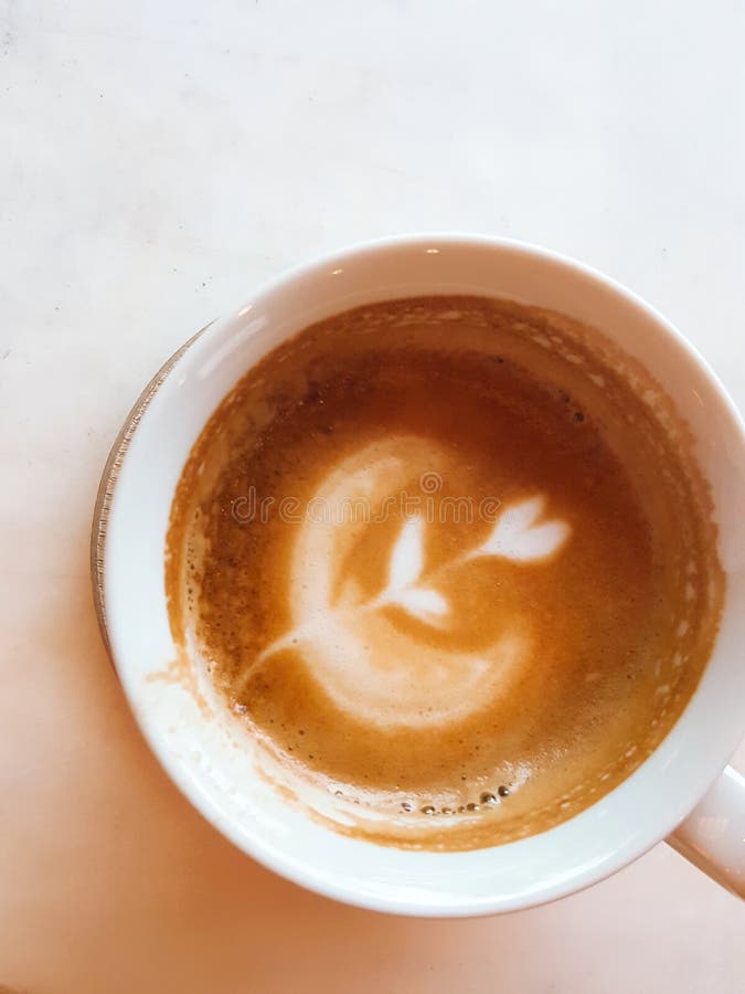 Halffilled Milk Coffee in a White Cup Stock Image Image of cafe