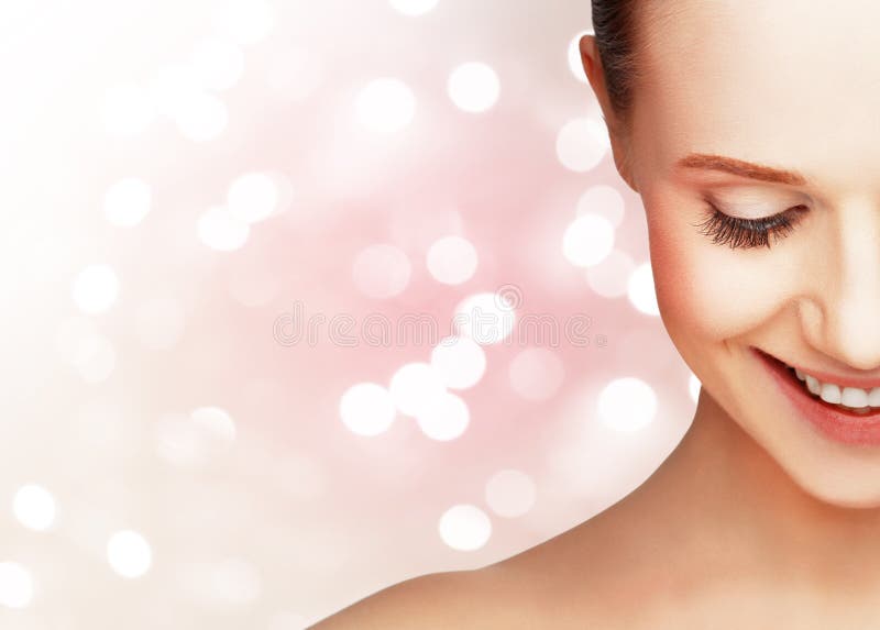 Half laughing face of beautiful healthy woman stock image Half laughing face of beautiful healthy woman stock image