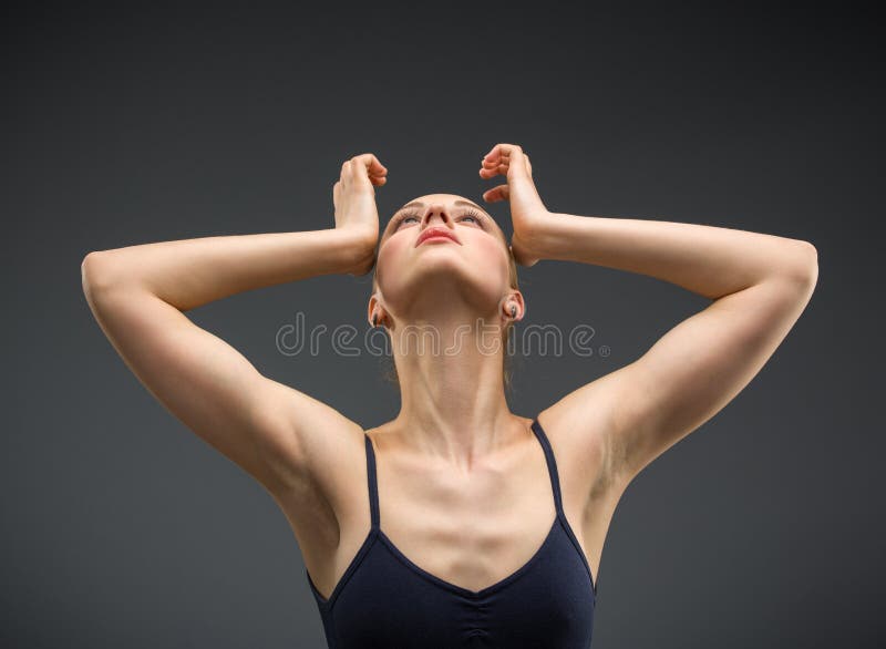 Half-length portrait of dancing ballerina with hands on head royalty free stock photo Half-length portrait of dancing ballerina with hands on head royalty free stock photo