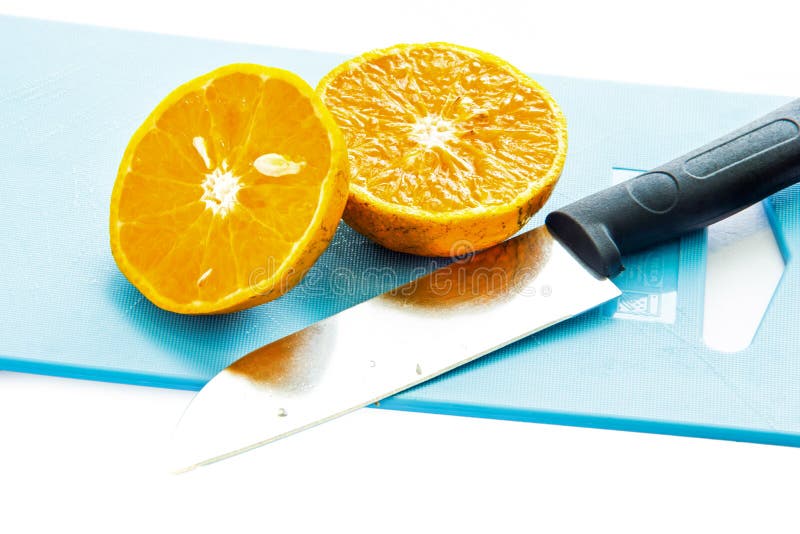 A Half of Orange Fruit and Knife Stock Photo Image of clear