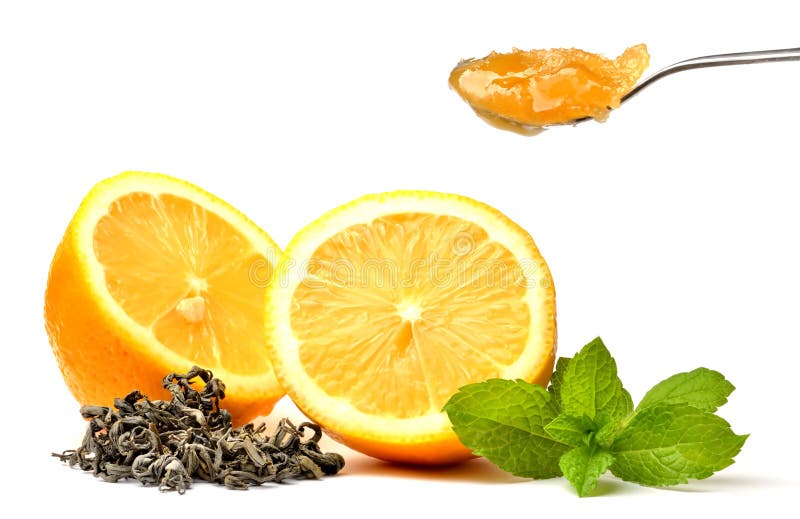 Half Pieced Lemon, Fresh Mint, Black Tea Leaves and Teaspoon of Honey