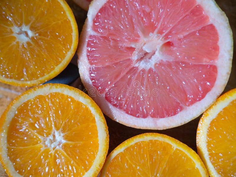 Half Pink Grapefruit and Orange Stock Photo Image of healthy, fruit