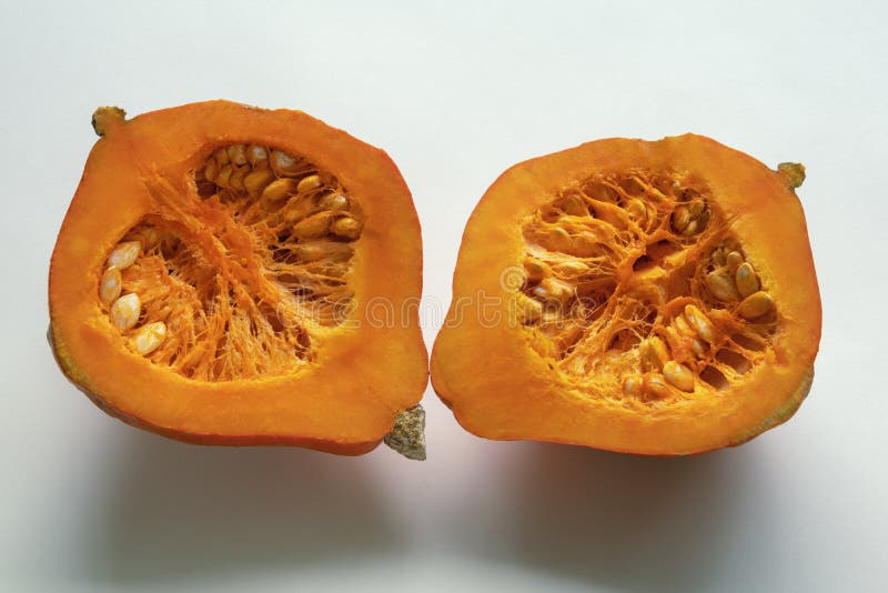 Halfs of Pumpkin with Pumpkin Seeds Stock Photo Image of color, food