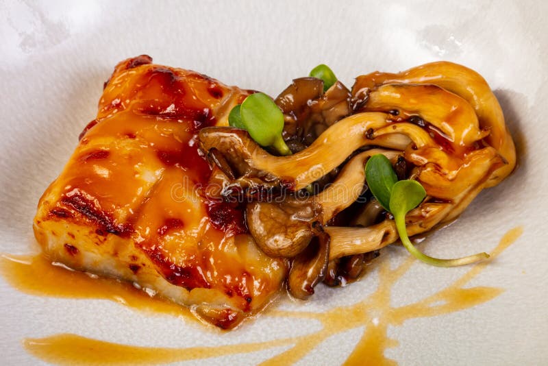 Halibut with mushroom stock photo. Image of mushrooms 119548910