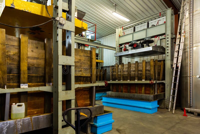 Hall with a automatization press for apples in factory, Asturian Sidreria