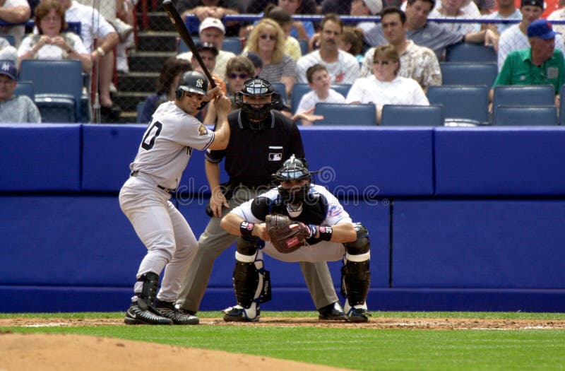 Battle of two Hall of Fame catcher, Jorge Posada of the New York Yankees bats with Hall of Fame catcher Mike Piazza behind home plate. Image taken from color slide. Battle of two Hall of Fame catcher, Jorge Posada of the New York Yankees bats with Hall of Fame catcher Mike Piazza behind home plate. Image taken from color slide.