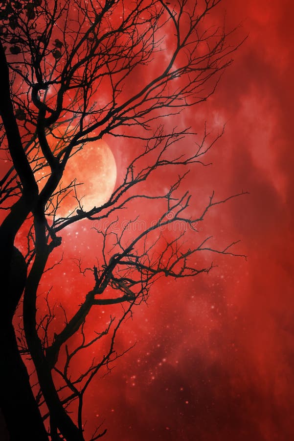 Halloween background with red moon and dead tree