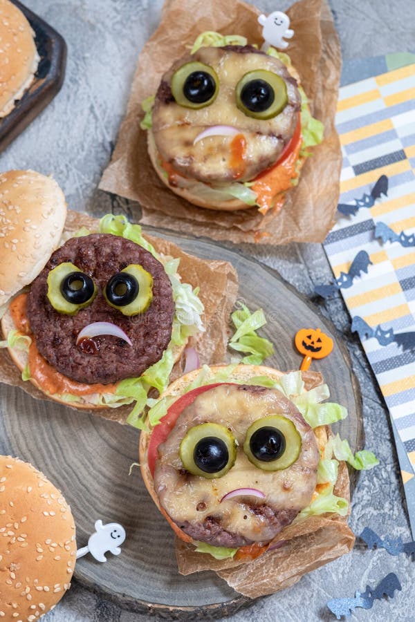 Halloween burger monsters stock photo. Image of eyes - 155246530