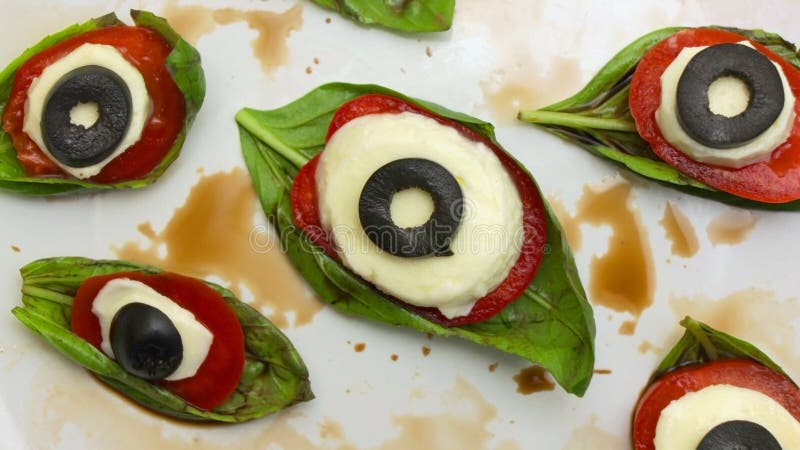 Halloween Eyeball Caprese Salad on a White Plate Stock Image - Image of ...