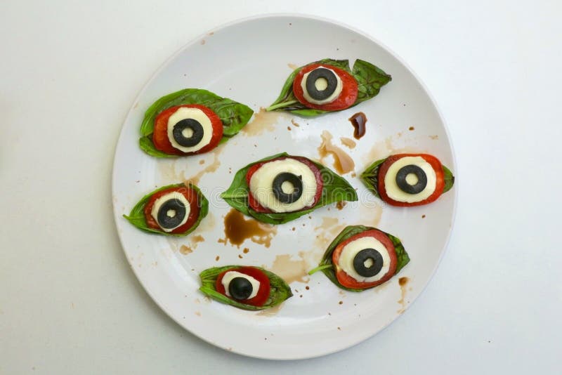 Halloween Eyeball Caprese Salad on a White Plate Stock Image - Image of ...