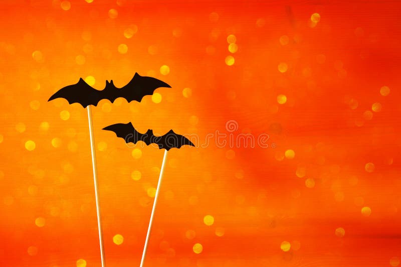 Halloween concept. Funny bats. Glitter overlay