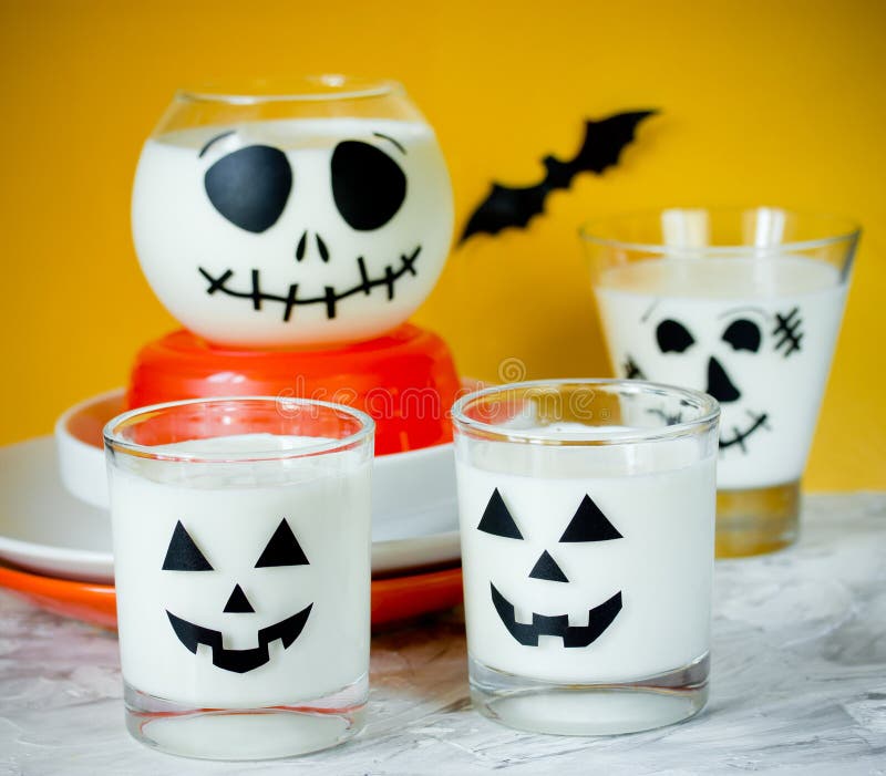 Halloween cup with white dessert or drink