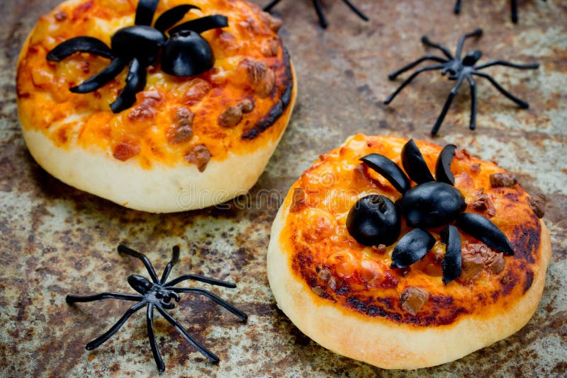 Halloween Food Background - Funny Mini Pizza with Olive Spider Stock ...