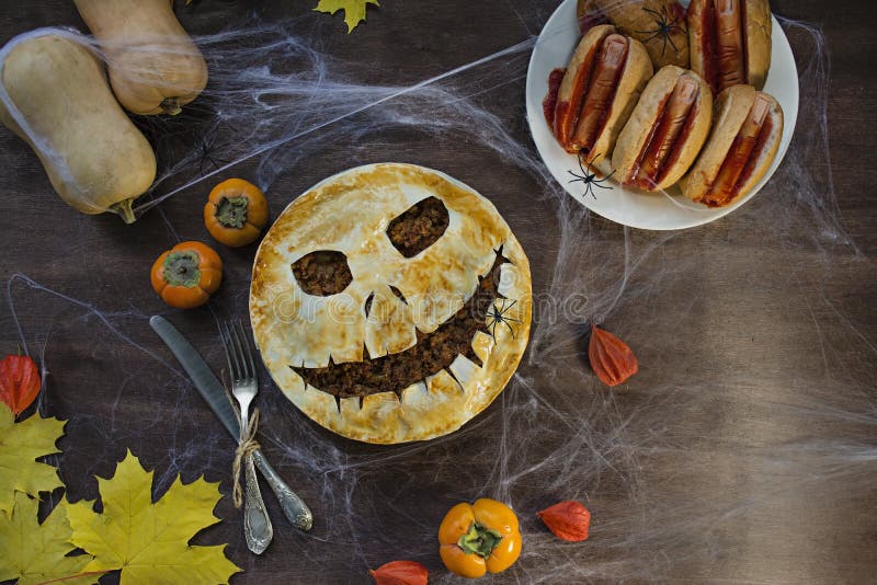 Halloween food. Halloween cake. Halloween homemade cakes. Autumn theme. Halloween homemade dessert idea.Halloween hot dog.Dark stock photo Halloween food. Halloween cake. Halloween homemade cakes. Autumn theme. Halloween homemade dessert idea.Halloween hot dog.Dark stock photo