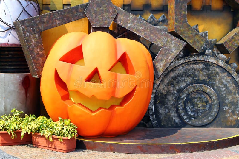 Decorative halloween pumpkin on display in the garden