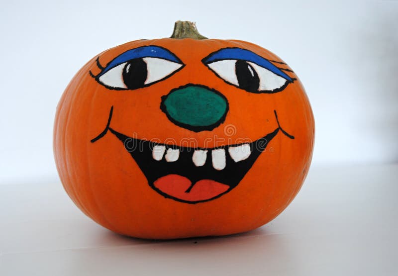 Happy face painted pumpkin stock image. Image of smile - 6013063