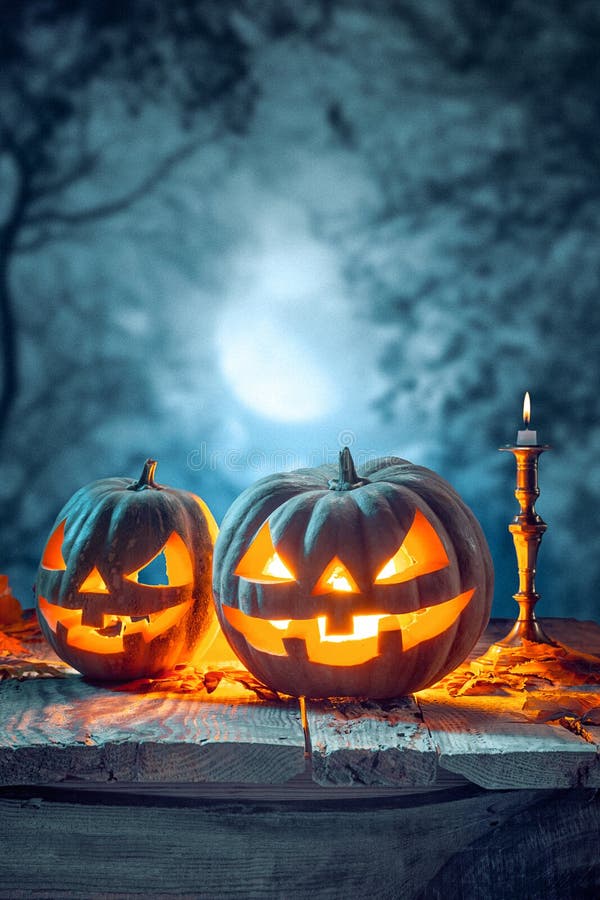 Halloween Pumpkins on Blue Background Stock Photo - Image of face ...
