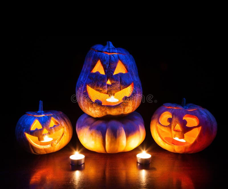 Halloween pumpkins glowing inside stock image Halloween pumpkins glowing inside stock image