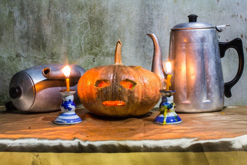 Halloween Still Life with Pumpkins, Candles and Classic Kettle Stock