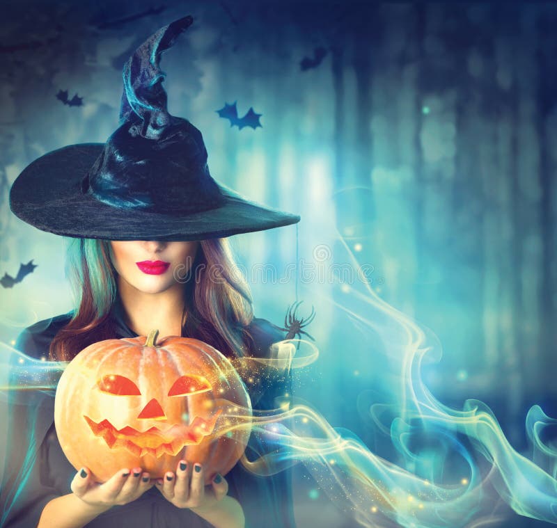 Halloweenowa czarownica z magiczną banią