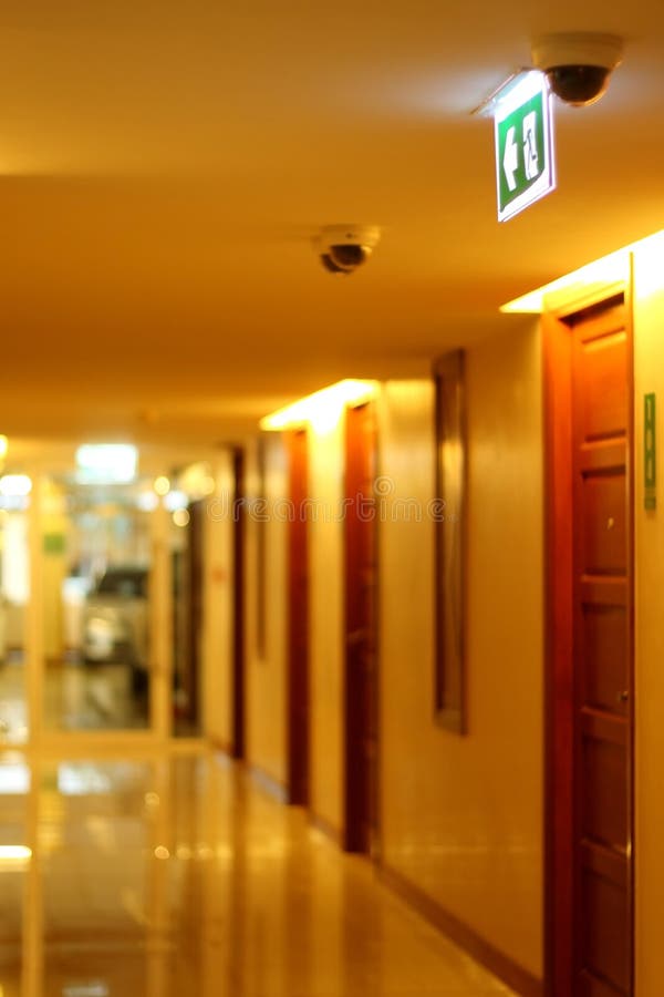 Hallway of Apartment Building in Yellow Tungsten Light. Stock Image