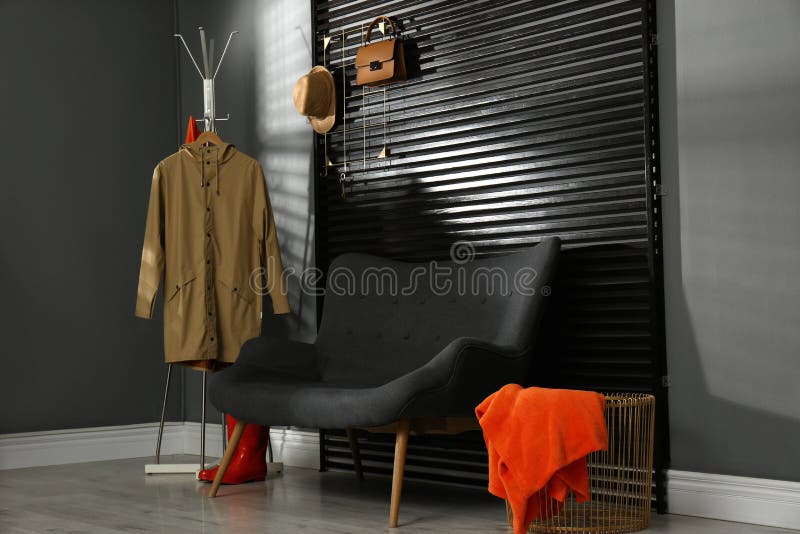 Hallway with Sofa, Clothes and Accessories Stock Image Image of