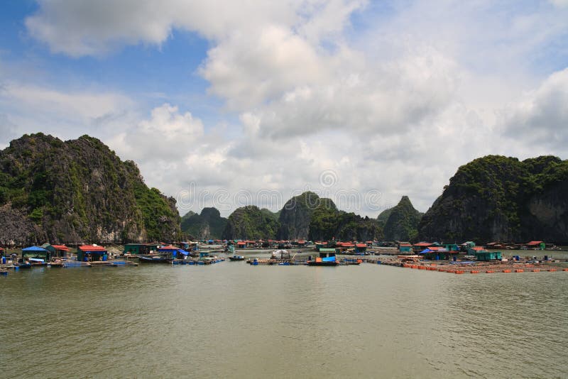 Halong Bay Fishing Village stock photo. Image of rocks 17859562