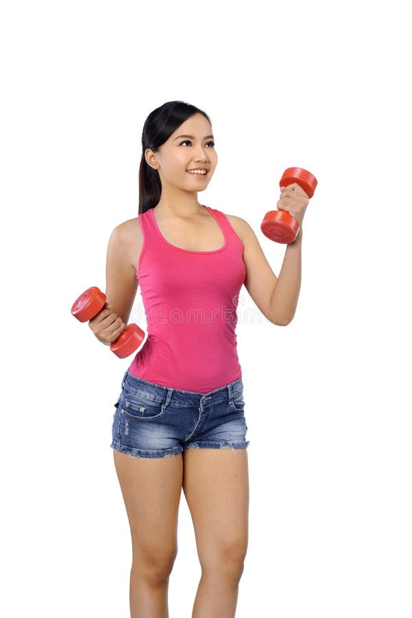 Haltères de levage de femme heureuse de forme physique photo libre de droits Haltères de levage de femme heureuse de forme physique photo libre de droits