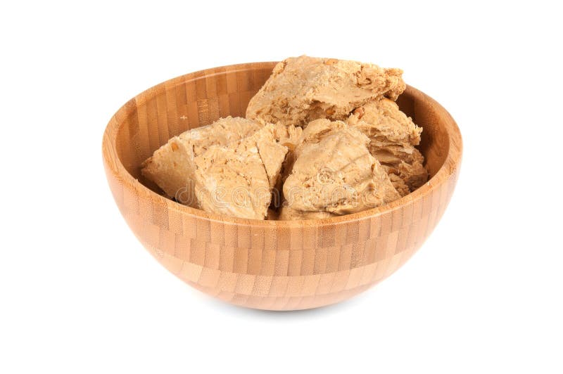 Delicious halva desser in brown bowl. Delicious halva desser in brown bowl