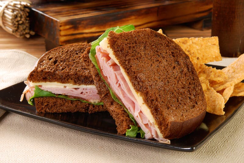 Ham And Cheese Sandwich With Chips Stock Photo Image of lettuce