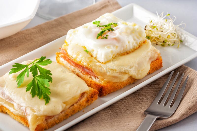 Ham and Cheese Sandwich with Melted Cheese and Fried Egg Stock Image