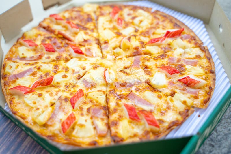 Ham and crab stick on crispy pizza royalty free stock images