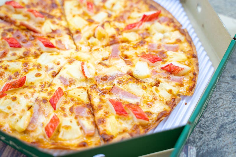 Ham and crab stick on crispy pizza stock photo