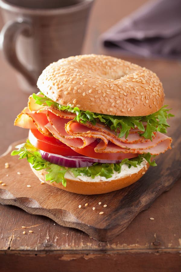 Ham Sandwich on Bagel with Cream Cheese Tomato Onion Stock Photo
