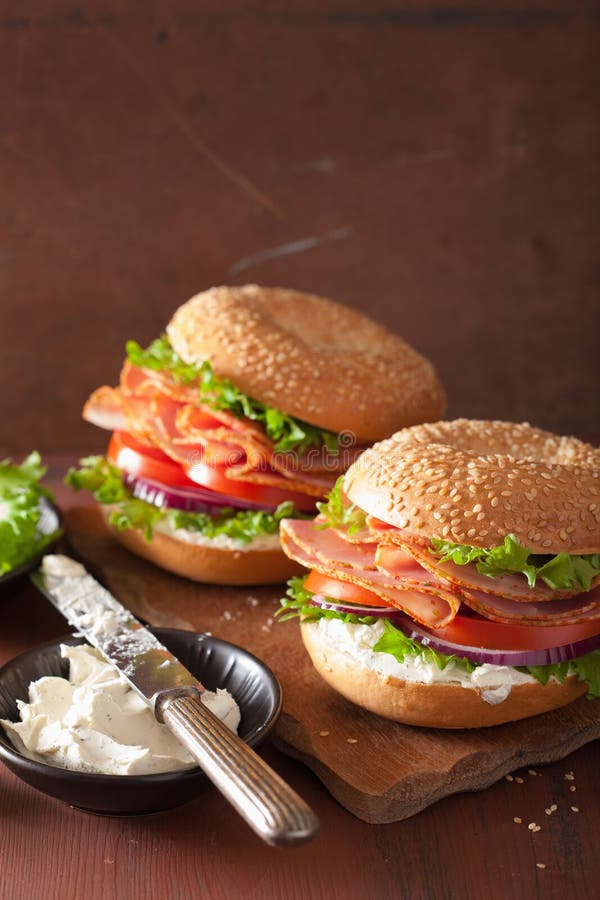 Ham Sandwich on Bagel with Cream Cheese Tomato Onion Stock Image
