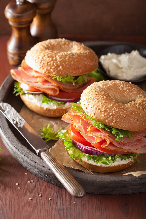 Ham Sandwich on Bagel with Cream Cheese Tomato Onion Stock Image