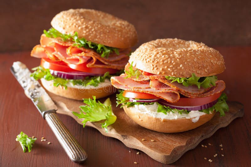 Ham Sandwich on Bagel with Cream Cheese Tomato Onion Stock Photo
