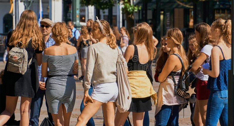 Hamburg, Germany, June 6., 2018: Young blonde girls on a guided tour through a German city