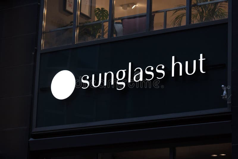 Sunglass Hut Sign in Hamburg Germany Editorial Image Image of white
