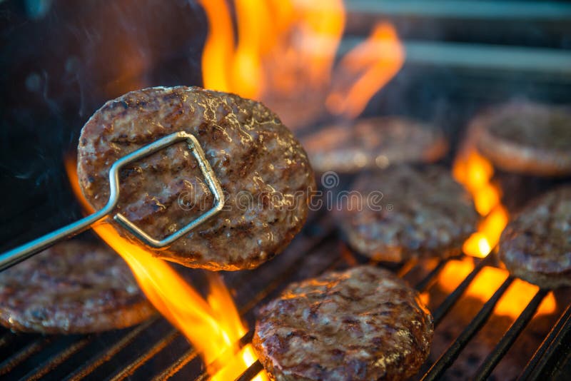Hamburger meat on barbecue stock photo. Image of cook - 34164992