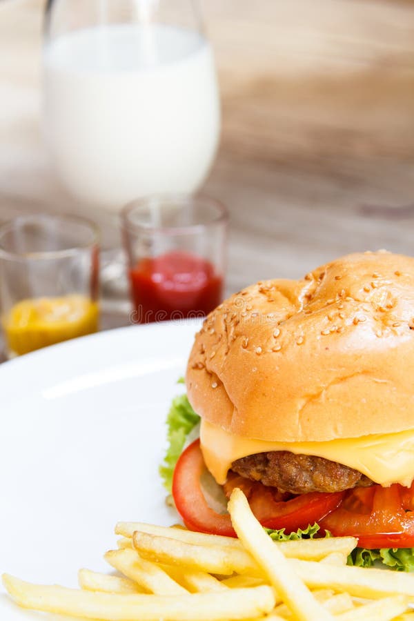 Hamburger and milk stock image. Image of beef, american 33085875